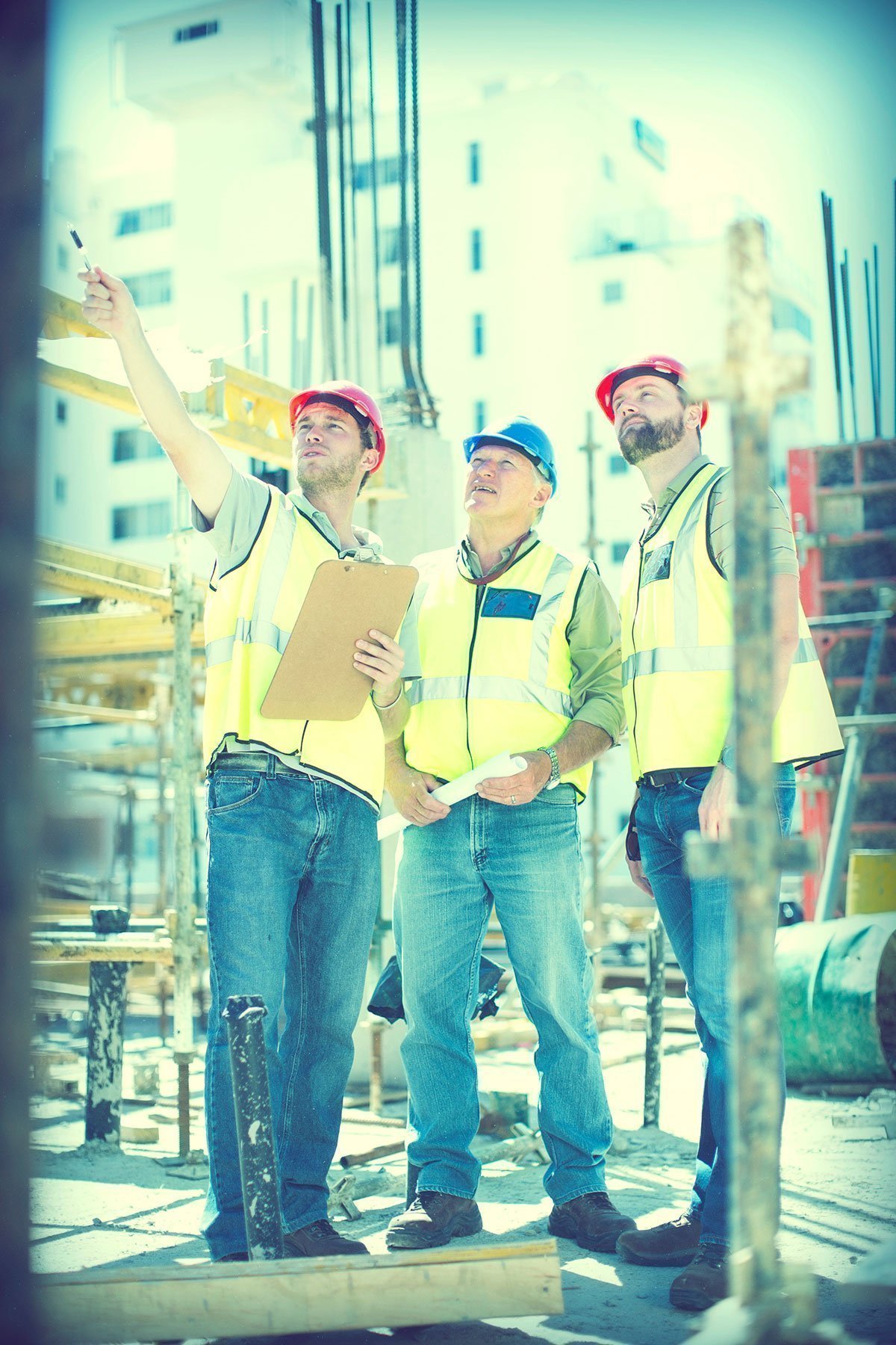 Image of two men working on construction site